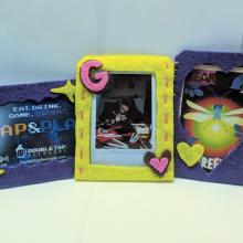 Photo of felt holders with pictures. 