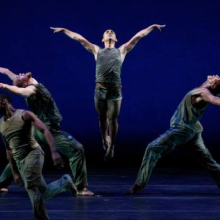 dancers perofrm in grey outfits