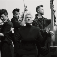 Black and white photo of Time for Three and Joyce DiDonato.