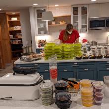 volunteer prepping meals at Ronald McDonal House kitchen
