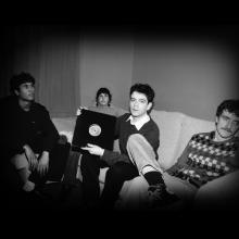 A black and white image of the band "My New Band Believe".