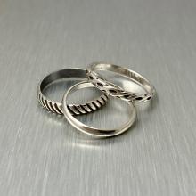 Photo of three rings made from metal. 