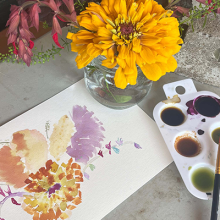 Photo of a watercolor painting based off flowers. 