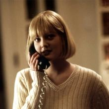 Drew Barrymore acress holding telephone