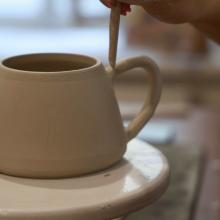 Photo of clay mug.