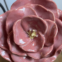 Photo of a clay pink flower.