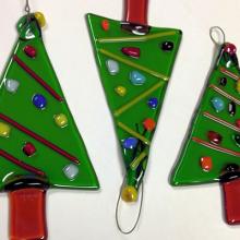 Fused glass Christmas trip ornaments.