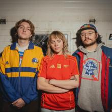Dicot band photo, three members stood together