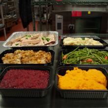 thanksgiving to go ham, mashed potatoes, stuffing, green beans, cranberry relish and sweet potatoes